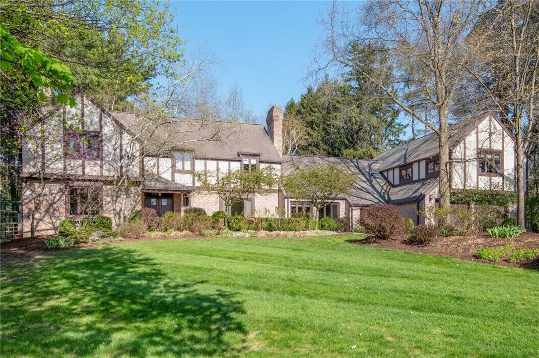 A large Tudor home on Highgate Road in Ithaca, New York
